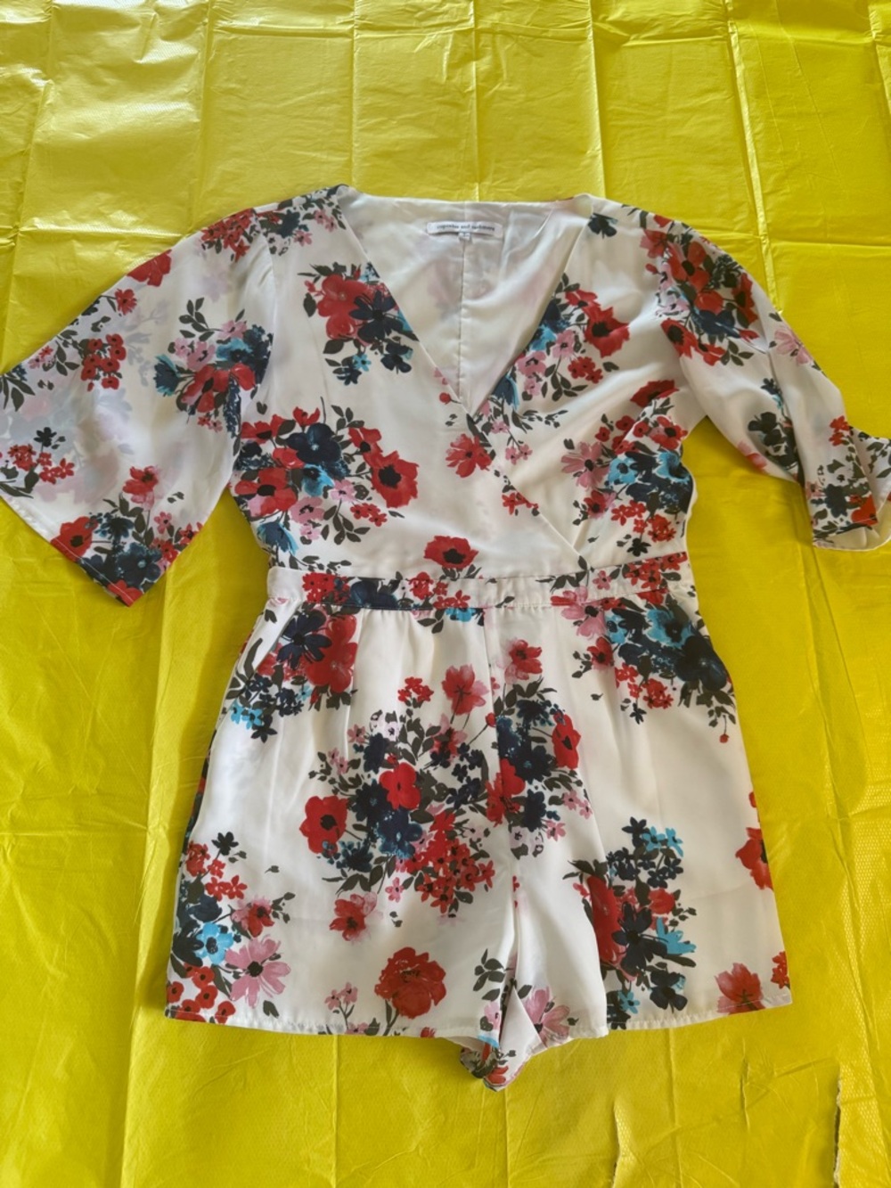 cupcakes & cashmere Floral V-Neck Romper in White with Red, Navy, Pink, Teal
